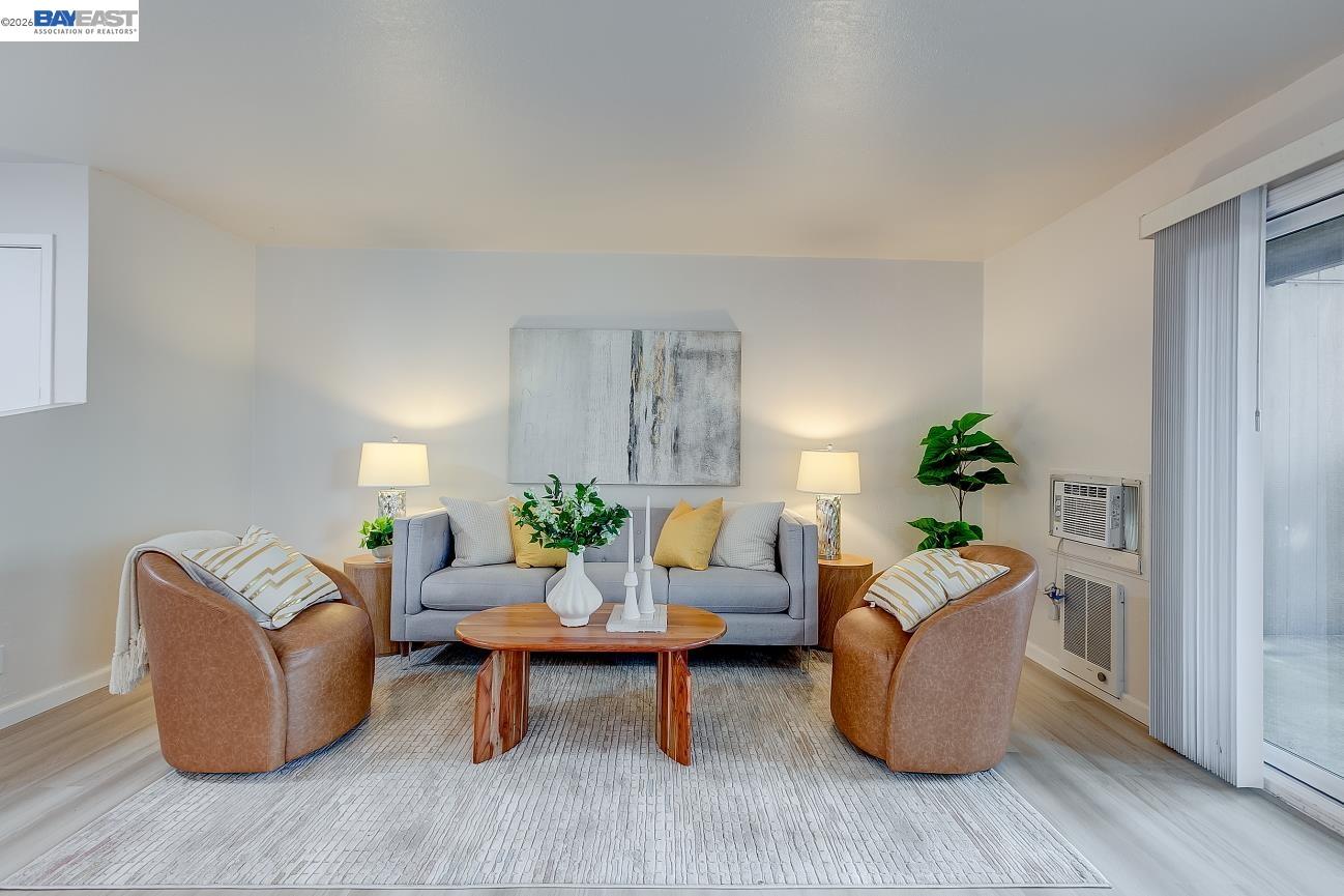 9005 Alcosta Boulevard, Unit 199 San Ramon, CA 94583 - Photo 13 of 57 a living room with furniture and a potted plant