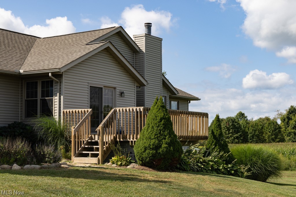 8383 Ickes Road Wooster, OH 44691 - Photo 6 of 32 Back of property featuring a wooden deck
