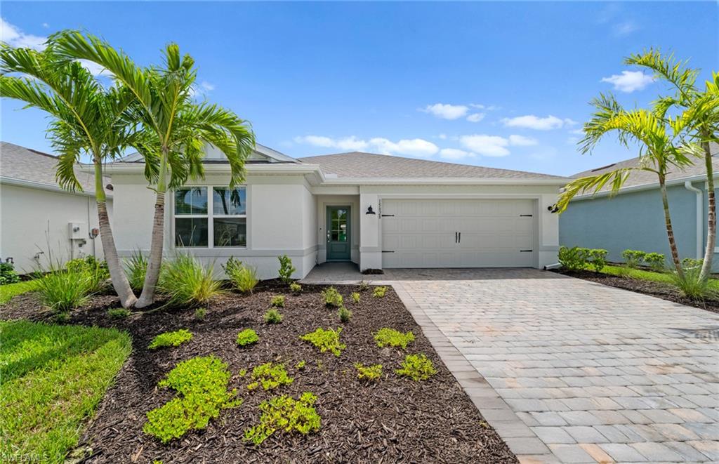 15828 Northridge Road Punta Gorda, FL 33982 - Photo 1 of 44 a front view of a house with a yard