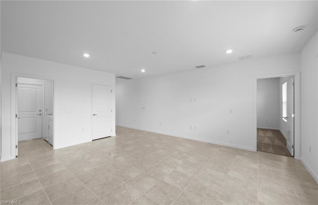15828 Northridge Road Punta Gorda, FL 33982 - Photo 8 of 44 an empty room with a bathroom