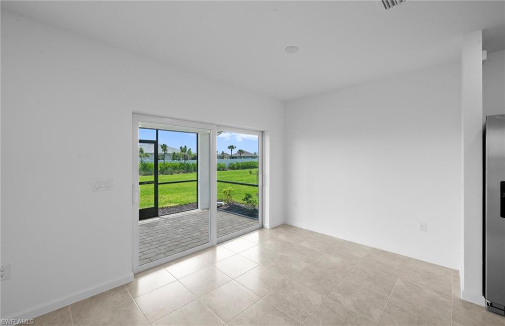 15828 Northridge Road Punta Gorda, FL 33982 - Photo 9 of 44 a view of an empty room with a balcony