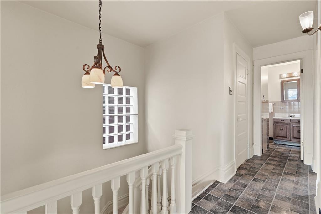 7215 Whipple Street Pittsburgh, PA 15218 - Photo 20 of 46 a view of a hallway with windows