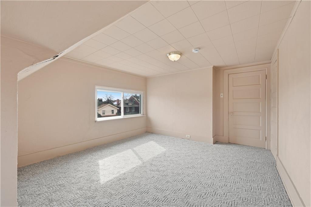 7215 Whipple Street Pittsburgh, PA 15218 - Photo 32 of 46 a view of an empty room with a window