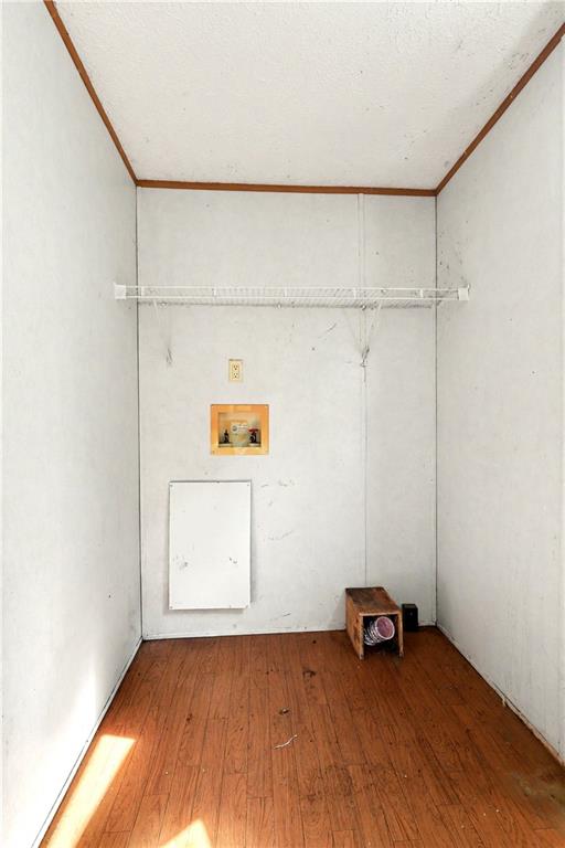 249 John Golden Road Temple, GA 30179 - Photo 43 of 45 a view of a room with wooden floor and a window