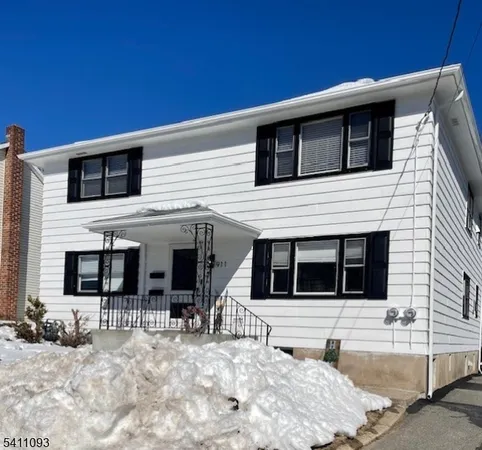 a house with trees in the background