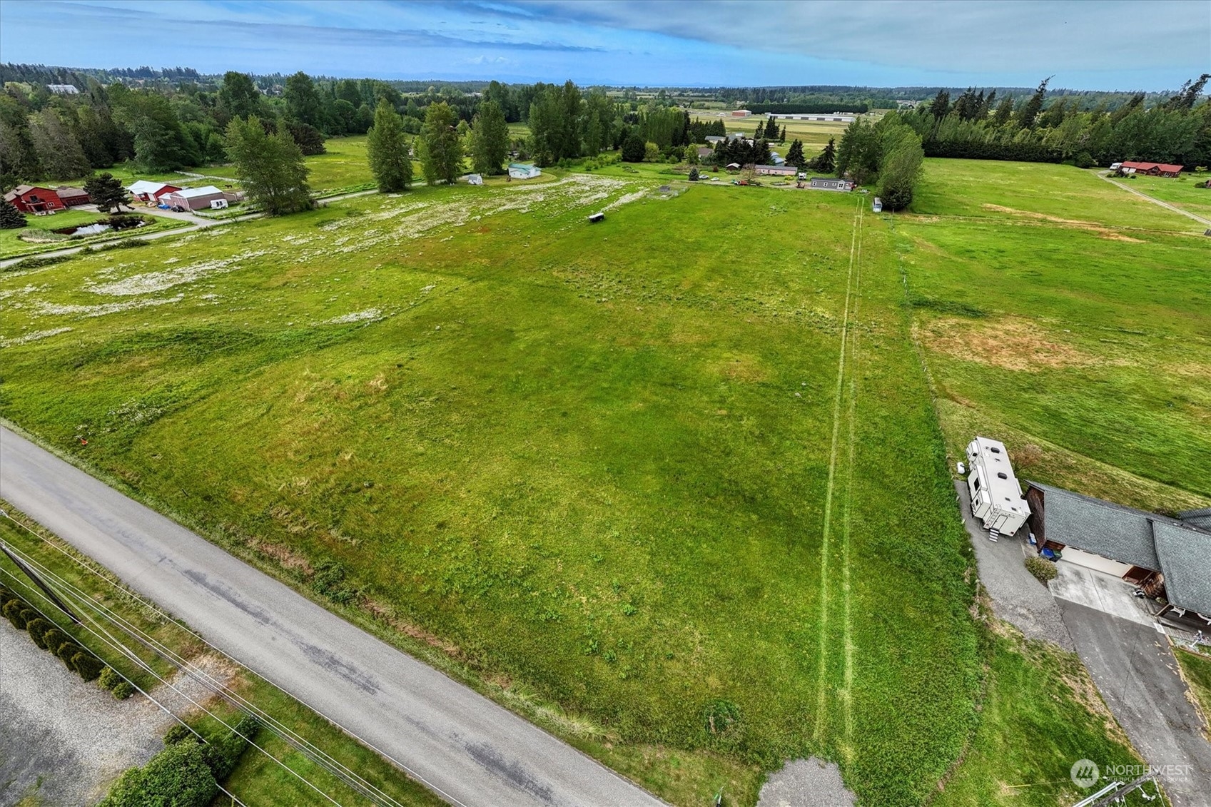 999 Spath Road Sequim, WA 98382 - Photo 18 of 20 a view of a golf course with chairs