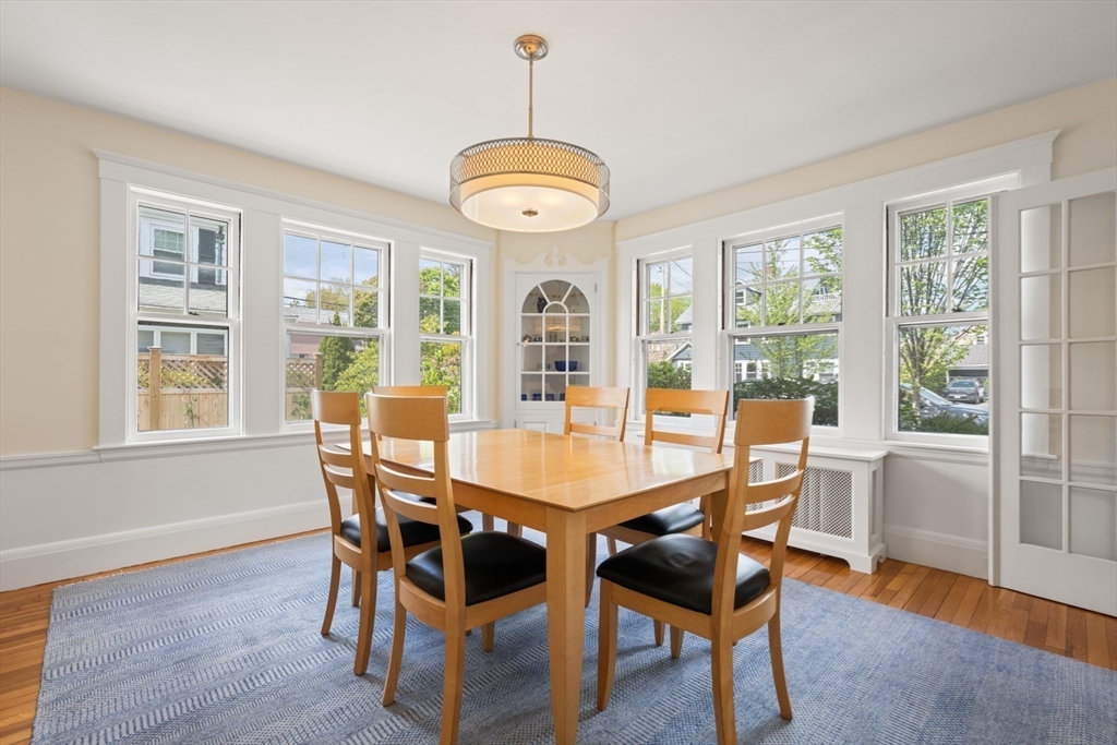 8 Charlotte Road Marblehead, MA 01945 - Photo 11 of 37 a view of a dining room with furniture window and wooden floor
