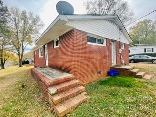 619 Jones Street Monroe, NC 28110 - Photo 4 of 6 a front view of house with yard