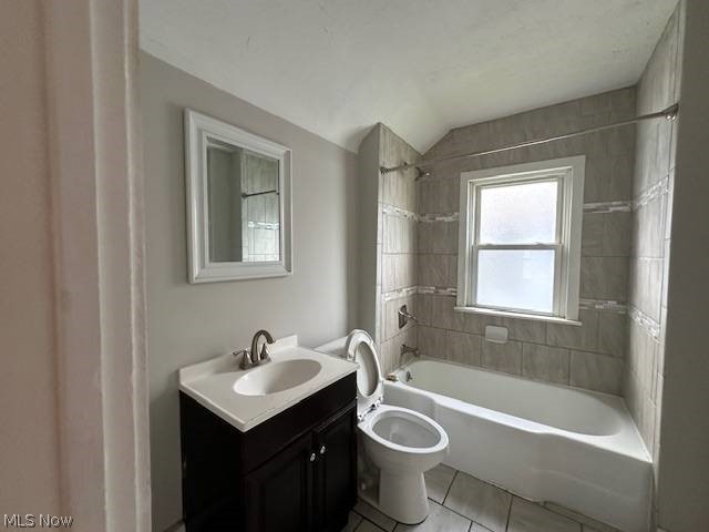 1752 South Taylor Road Cleveland, OH 44118 - Photo 14 of 14 Full bathroom with tile flooring, vanity, toilet, and tiled shower / bath combo