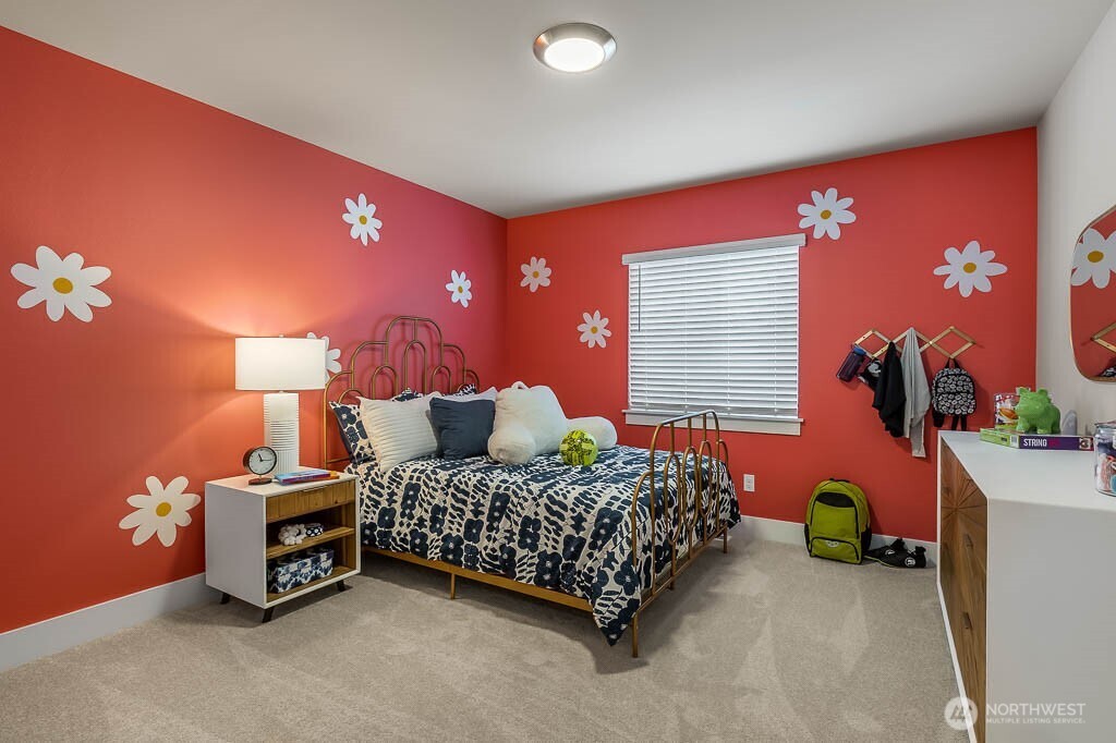 3826 194th Street Southeast Bothell, WA 98012 - Photo 22 of 25 a bedroom with a bed and a lamp with window