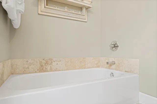 a bathroom with a bathtub