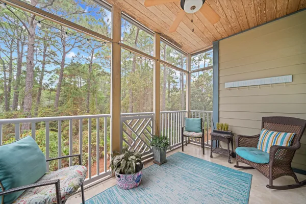 a view of roof deck with furniture