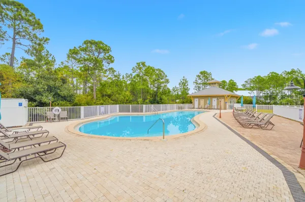 a view of a swimming pool with a patio
