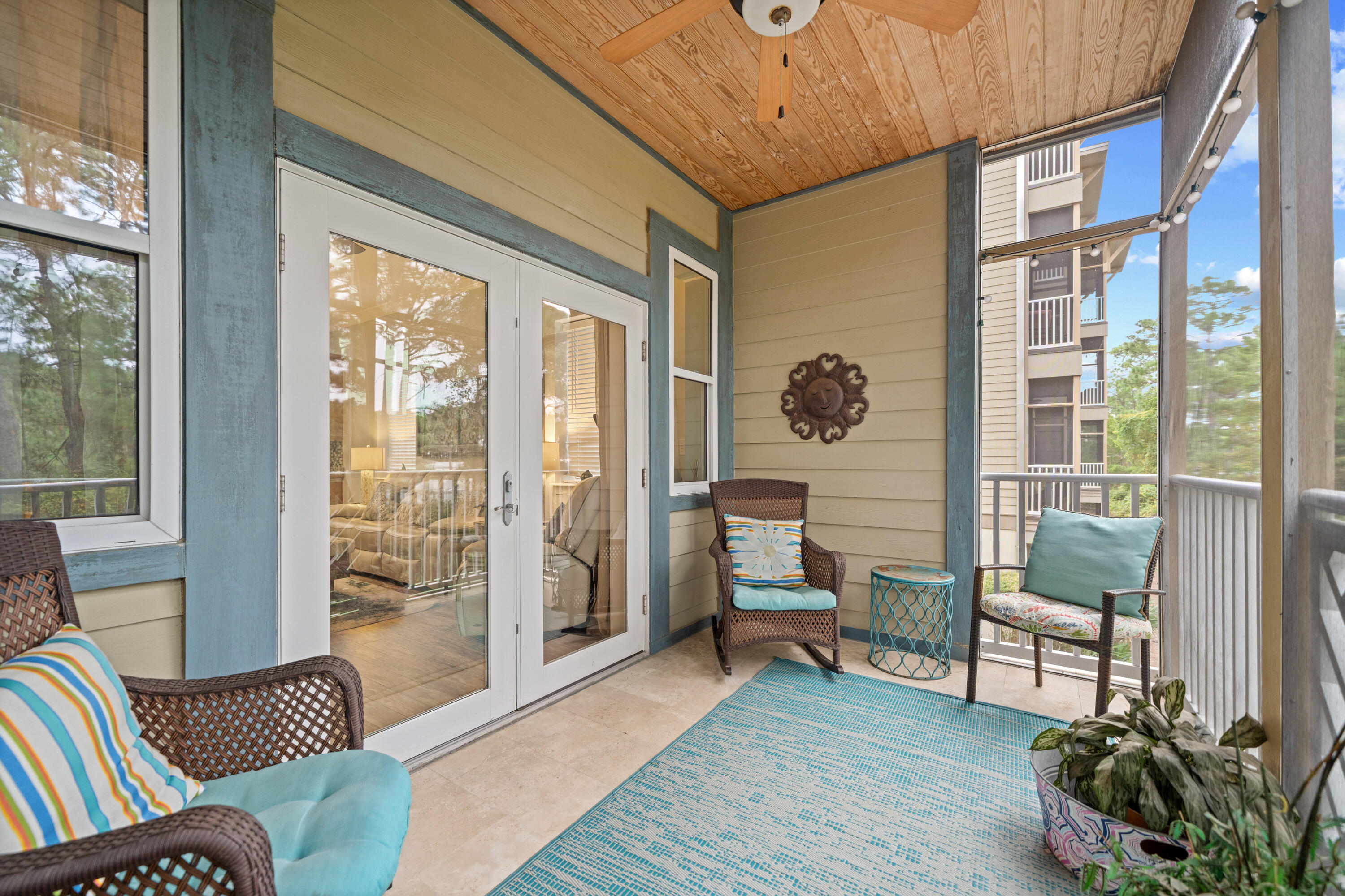 231 Somerset Bridge Road, Unit 2205 Santa Rosa Beach, FL 32459 - Photo 5 of 37 a living room with furniture and a floor to ceiling window