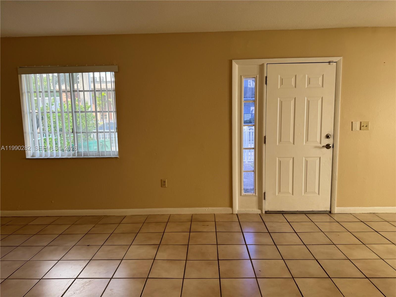 1124 Northwest 3rd Street Miami, FL 33128 - Photo 4 of 5 a view of an empty room