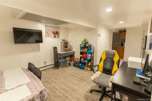 a bedroom with a workspace