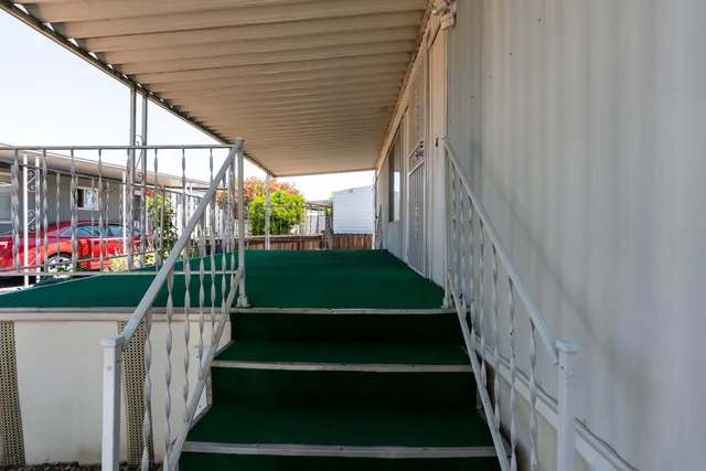 a view of stairs and a garden