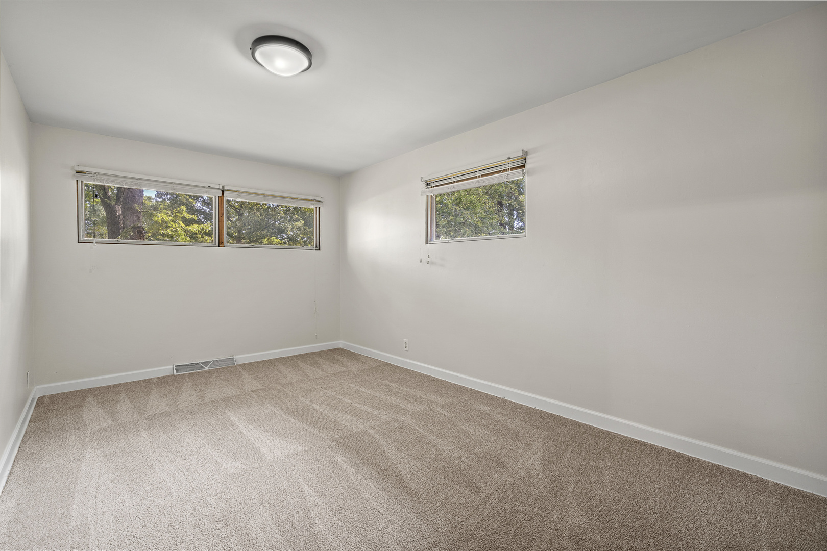 7S174 Wild Cherry Road Naperville, IL 60540 - Photo 11 of 25 an empty room with windows