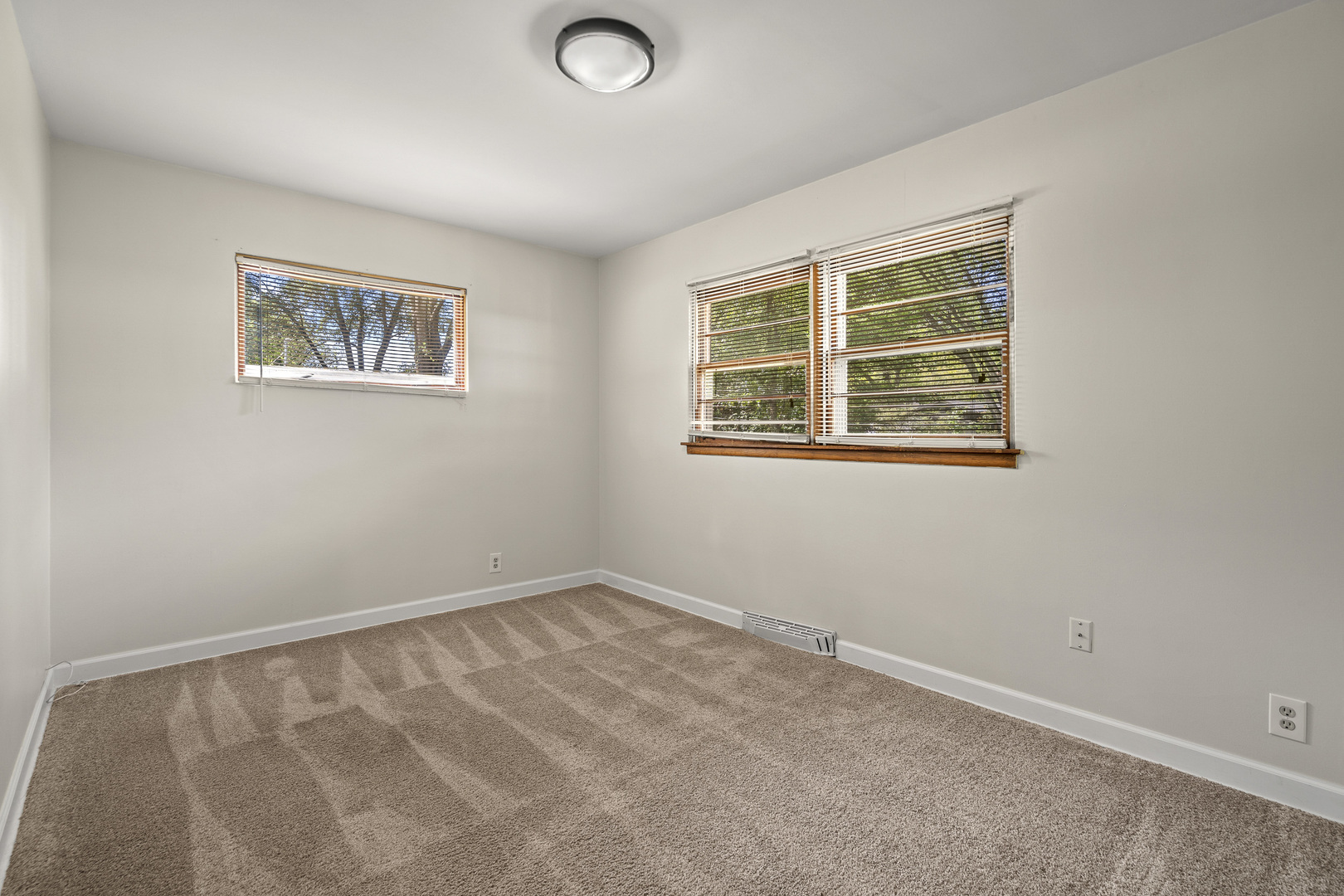 7S174 Wild Cherry Road Naperville, IL 60540 - Photo 12 of 25 an empty room with a window