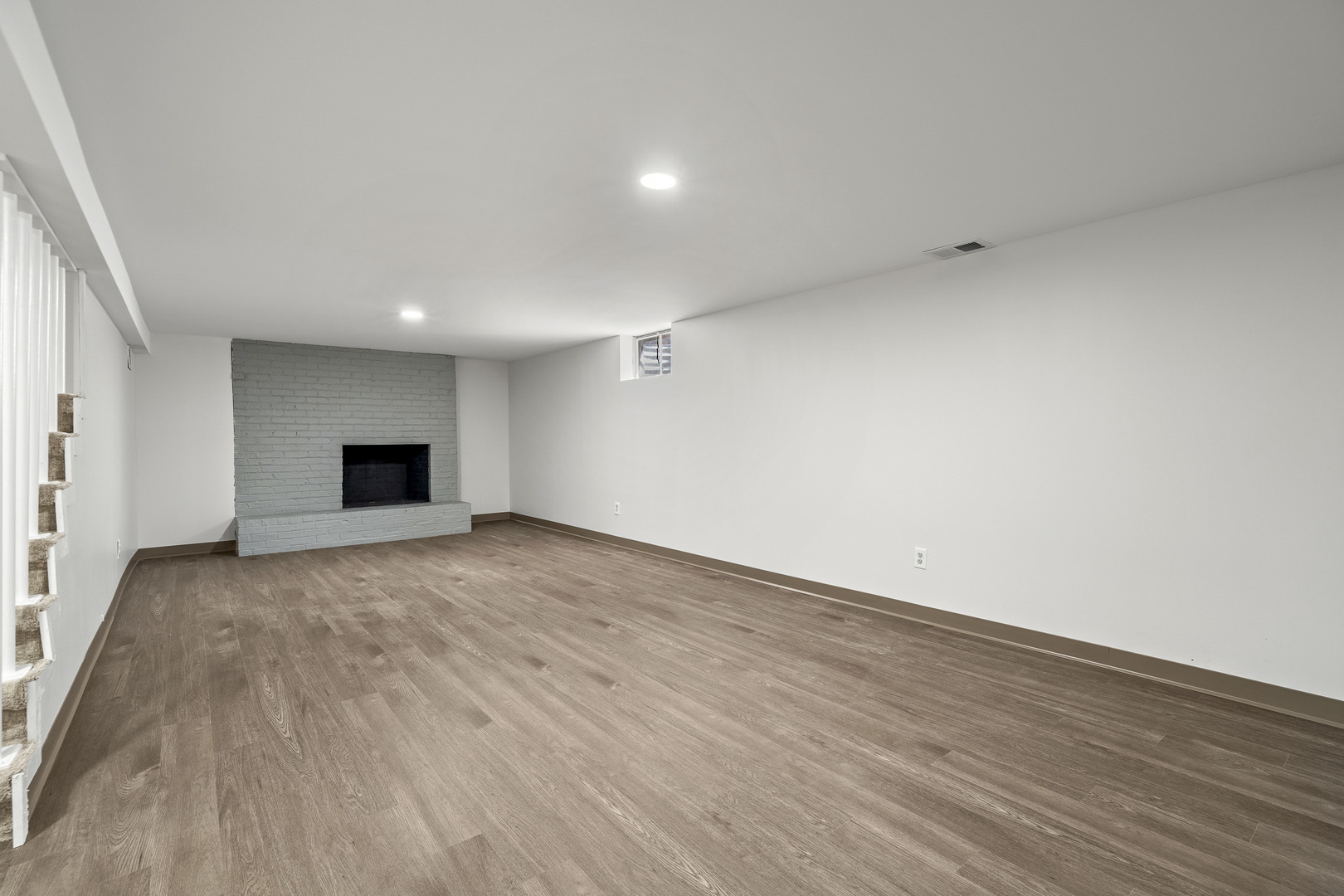 7S174 Wild Cherry Road Naperville, IL 60540 - Photo 19 of 25 a view of empty room with wooden floor