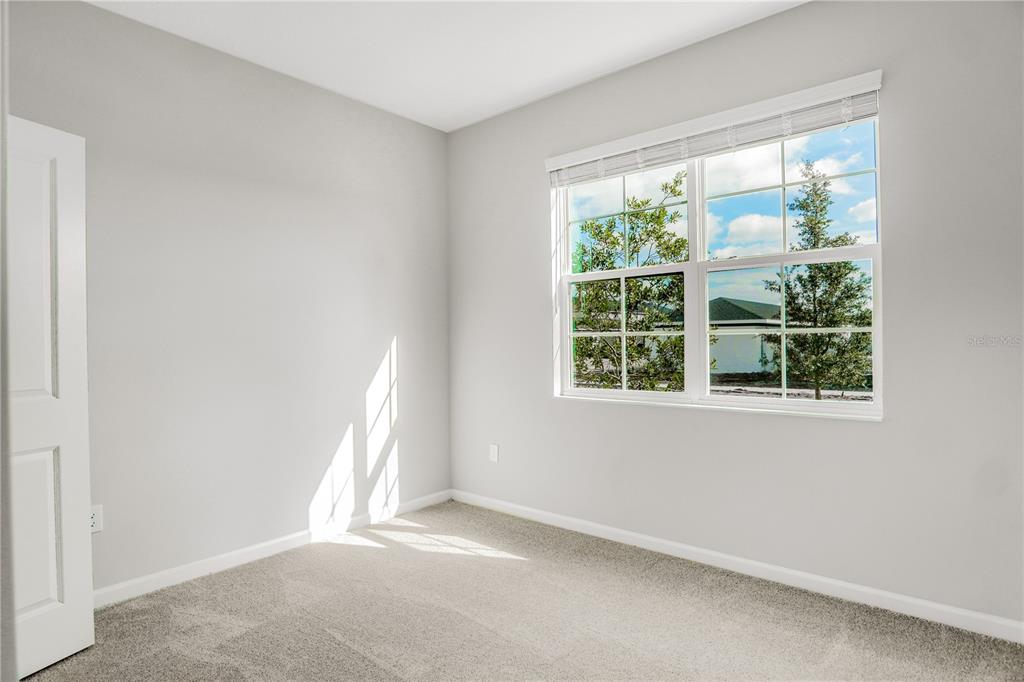 5286 Teirgarten Street St. Cloud, FL 34771 - Photo 4 of 26 a view of a window in an empty room