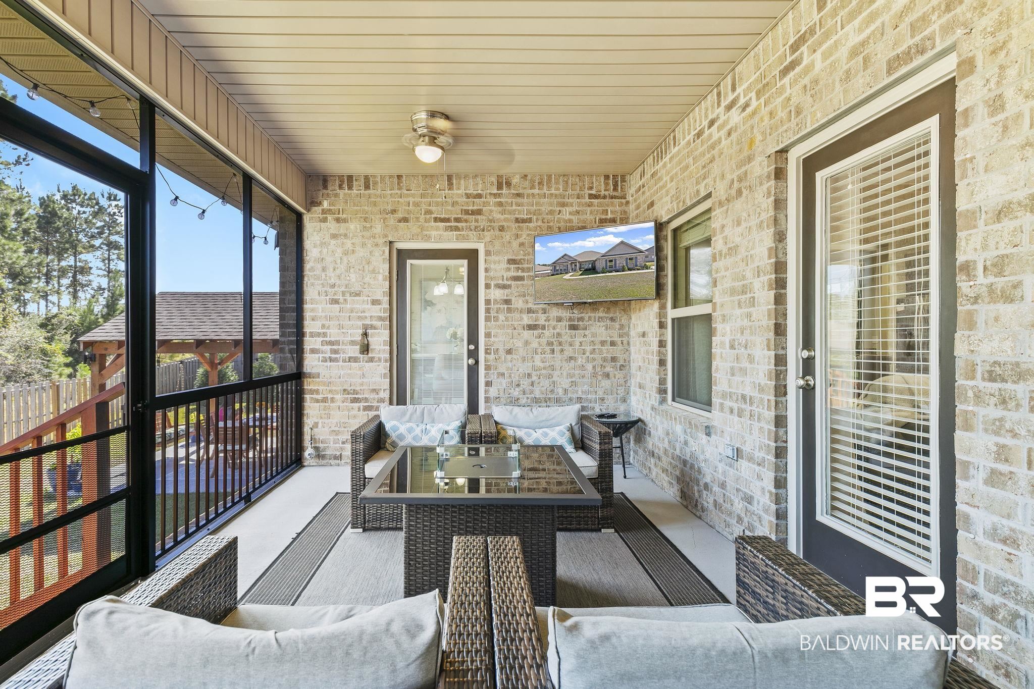 31500 Spoonbill Road Daphne, AL 36527 - Photo 50 of 85 Sunroom featuring ceiling fan and wood ceiling