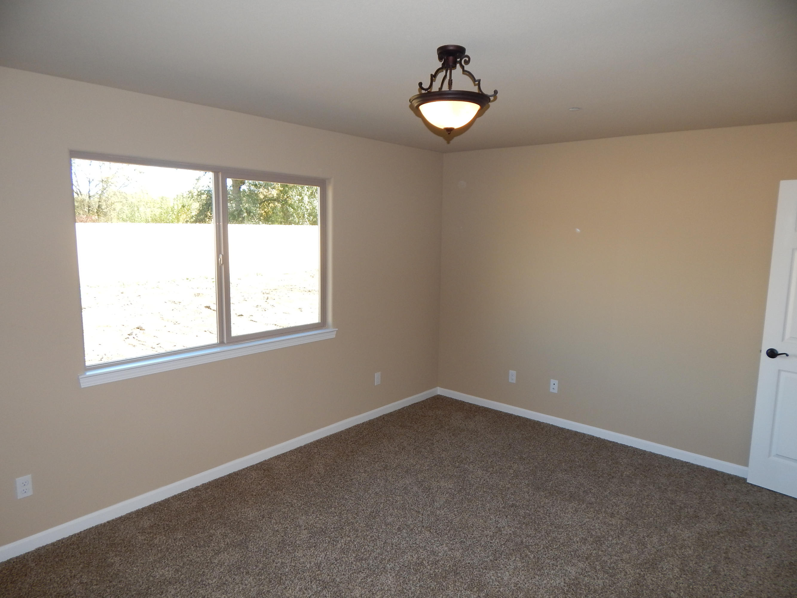 3531 Archer Road Igo, CA 96047 - Photo 31 of 34 an empty room with a window