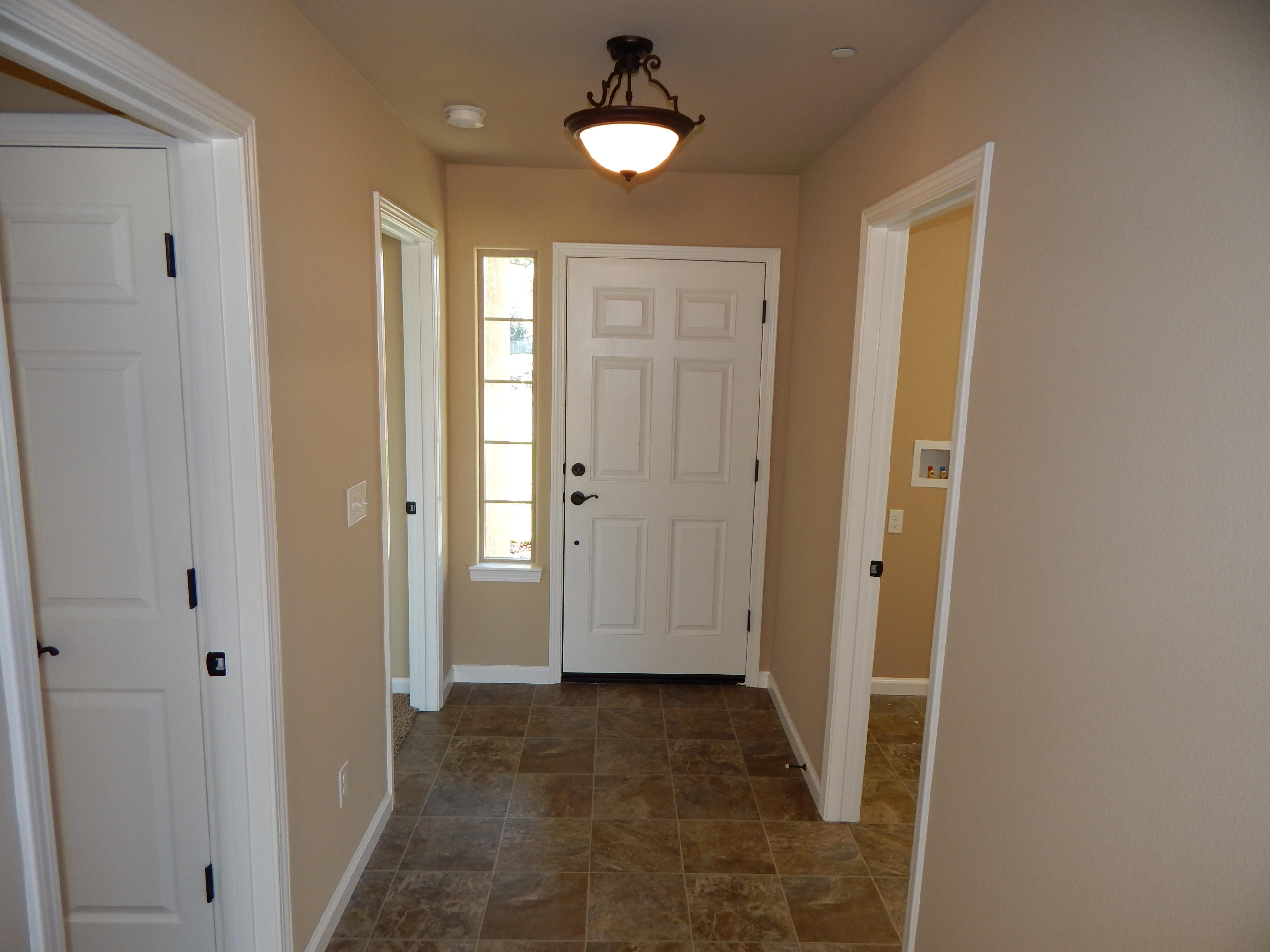 3531 Archer Road Igo, CA 96047 - Photo 4 of 34 a view of a hallway with wooden shelves