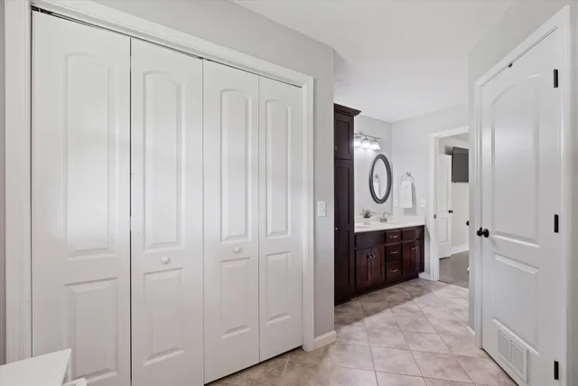a view of a hallway with washer and dryer