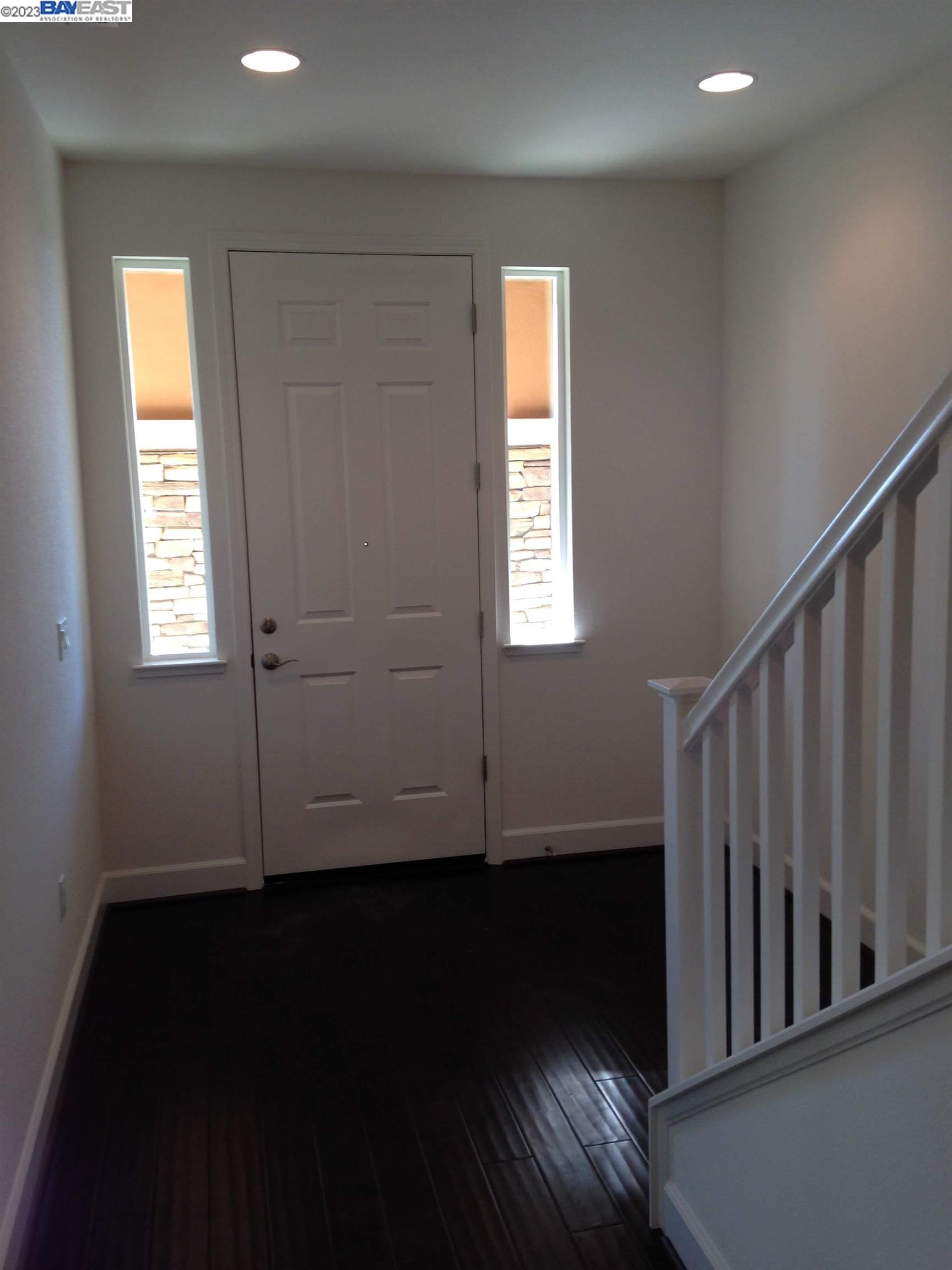 1940 Lee Way Milpitas, CA 95035 - Photo 2 of 11 a view of wooden floor and windows in a room