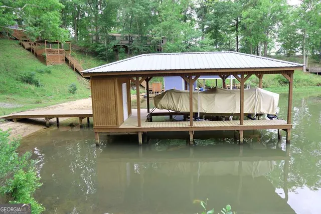 a view of swimming pool with a yard