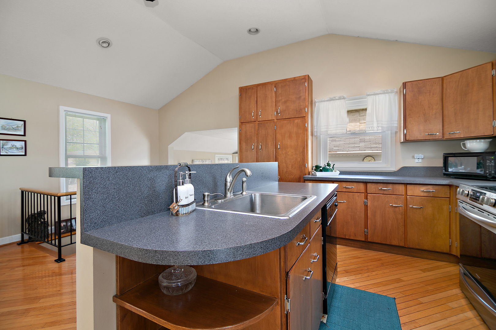 3119 River Road Kankakee, IL 60901 - Photo 14 of 39 a kitchen with granite countertop a sink stainless steel appliances and cabinets