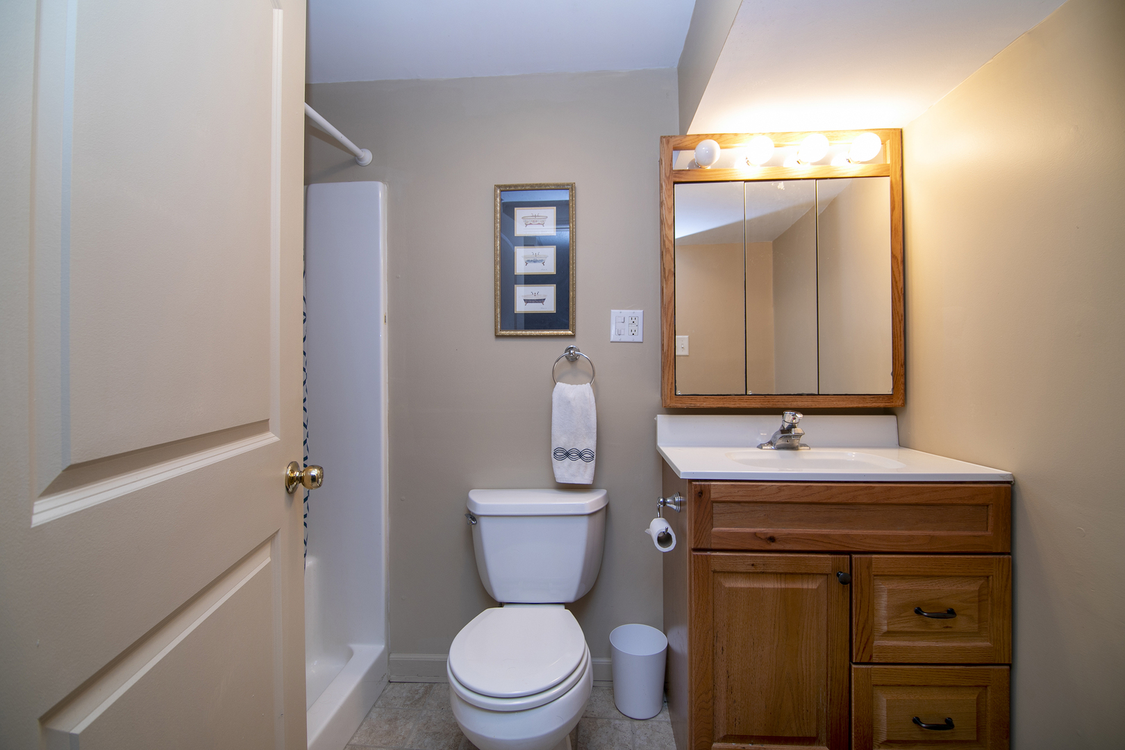 3119 River Road Kankakee, IL 60901 - Photo 21 of 39 a bathroom with a toilet sink and mirror