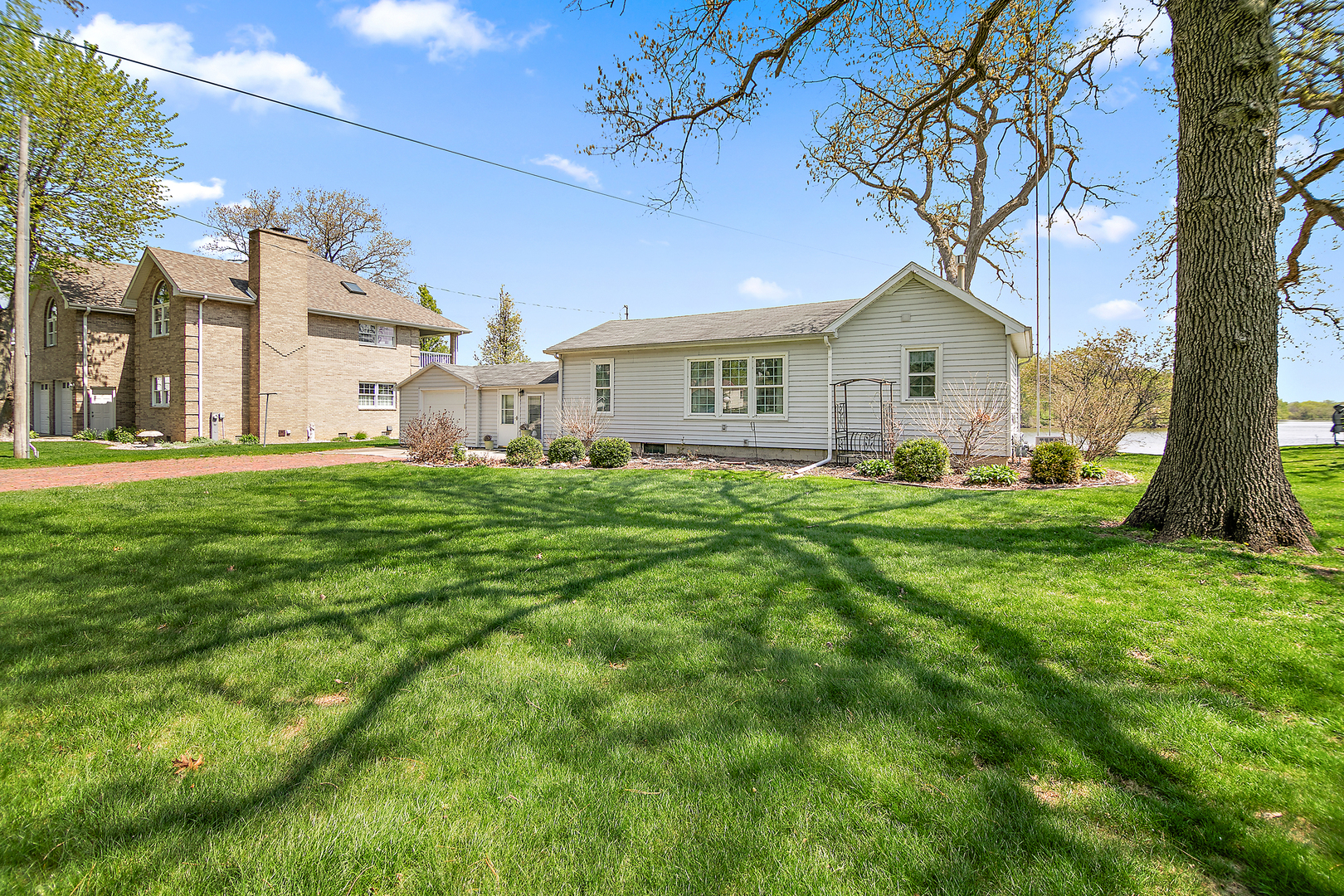 3119 River Road Kankakee, IL 60901 - Photo 3 of 39 a front view of a house with a yard