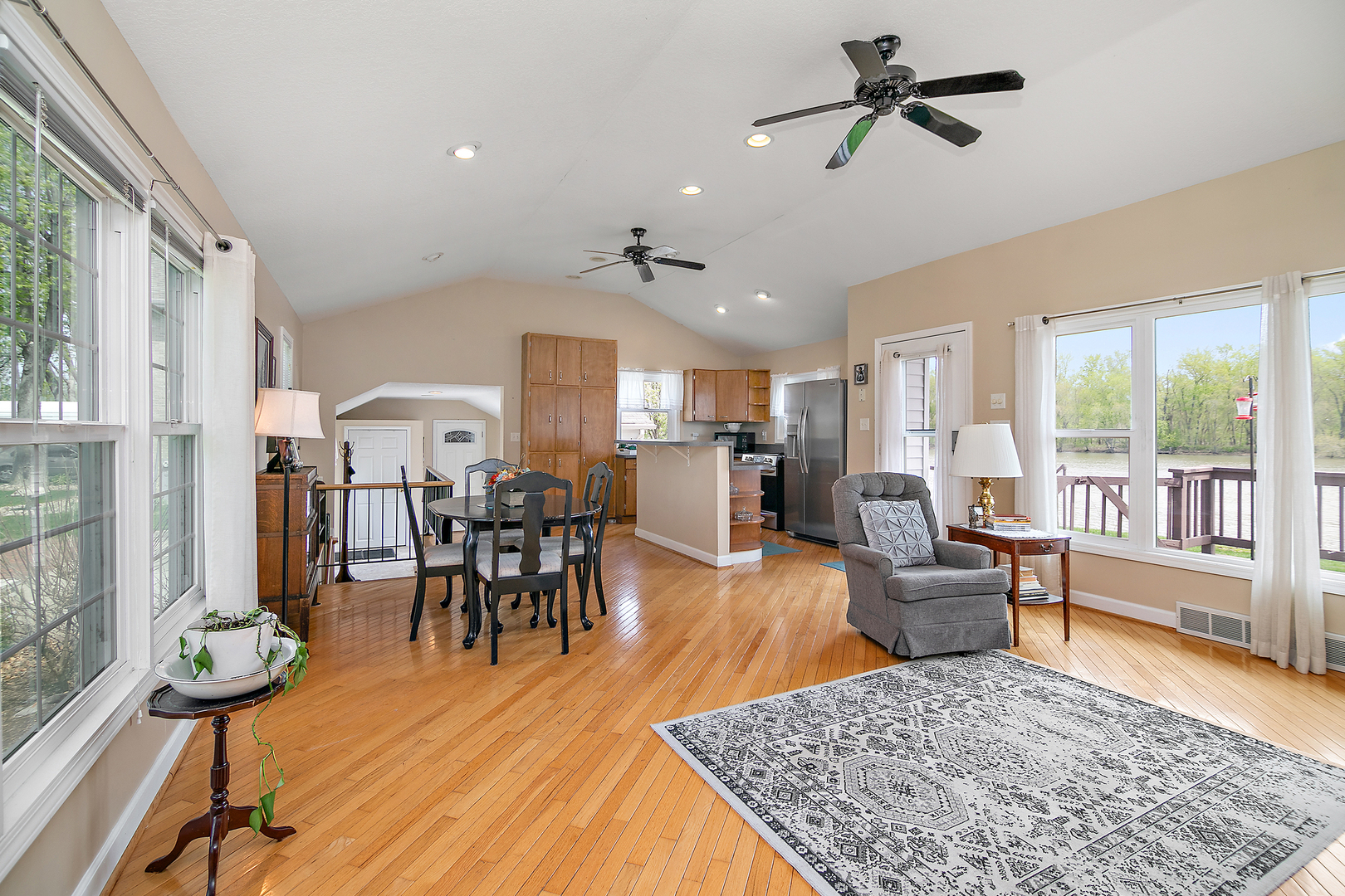 3119 River Road Kankakee, IL 60901 - Photo 8 of 39 a living room with furniture dining table and a rug