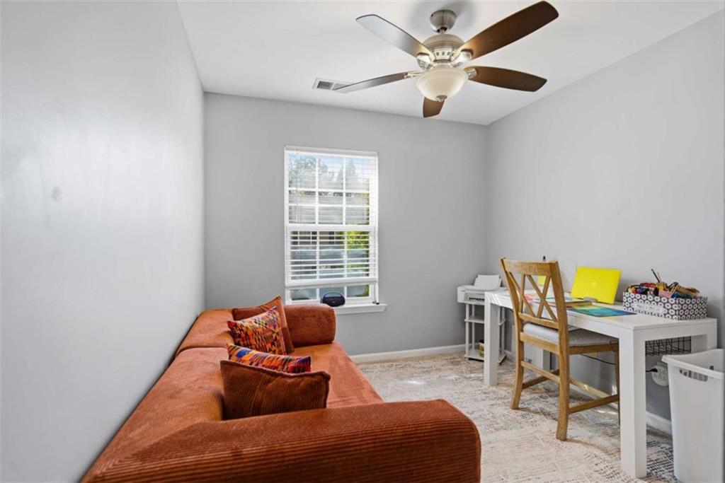 638 Providence Place Southwest Atlanta, GA 30331 - Photo 15 of 22 a living room with furniture and a window