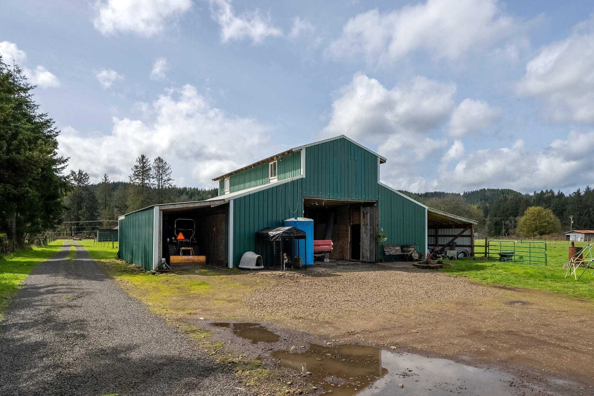 7400 South Prairie Road Tillamook, OR 97141 - Photo 28 of 62 a view of a house with a yard