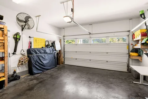 a swimming pool with wooden fence