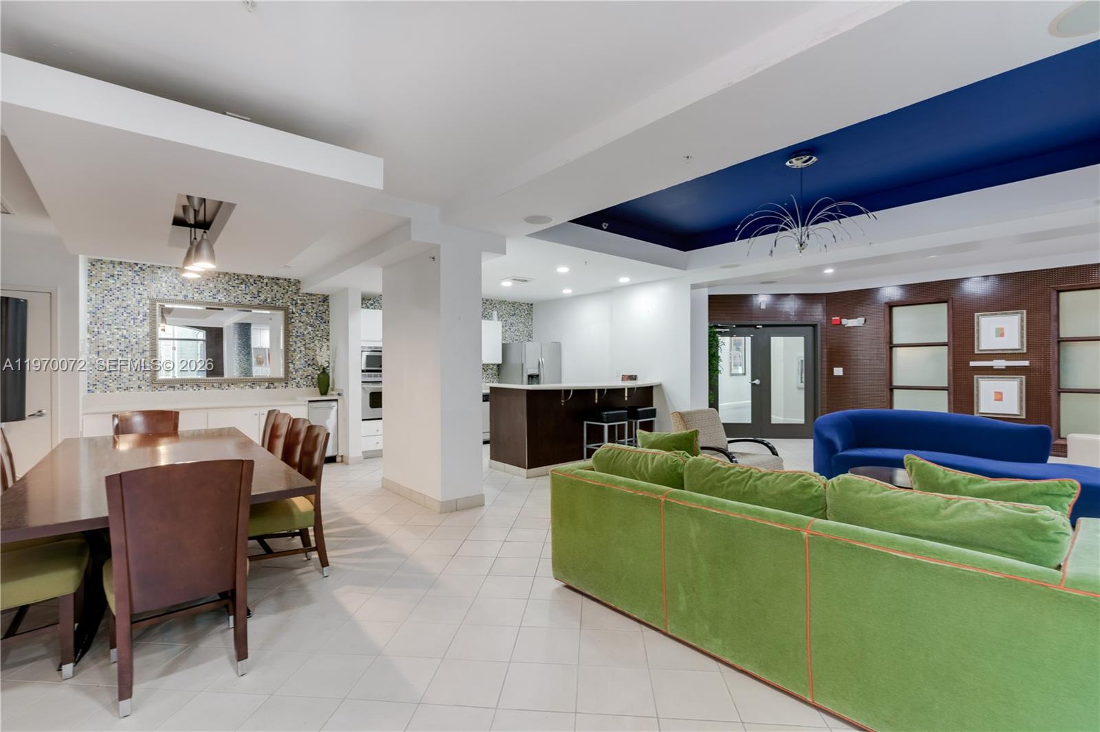 6001 Southwest 70th Street, Unit 221 South Miami, FL 33143 - Photo 6 of 12 a living room with furniture and a fireplace