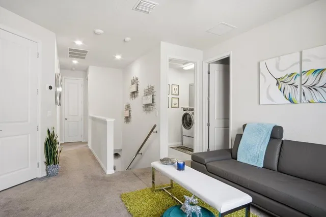 a bathroom with a granite countertop sink a large mirror and a shower