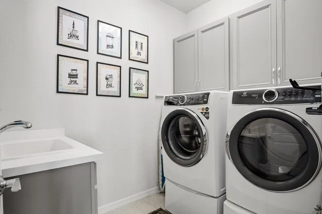 a bathroom with a sink double vanity and a mirror
