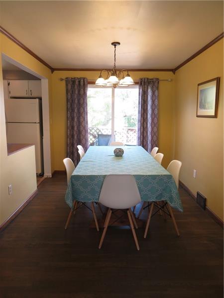 1074 Brinton Road Pittsburgh, PA 15221 - Photo 4 of 18 Dining room area with access to an outdoor deck.
