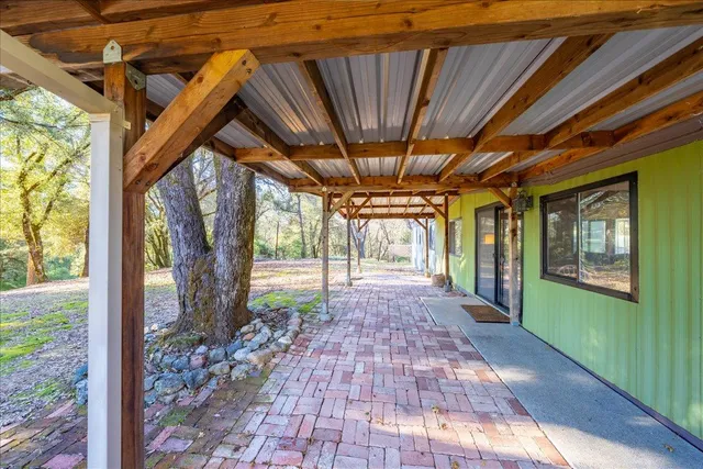 a kitchen that has a sink and a stove