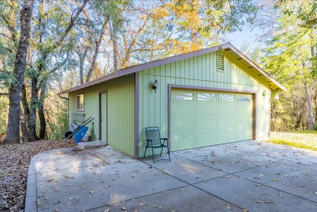 a view of outdoor space with table and chairs