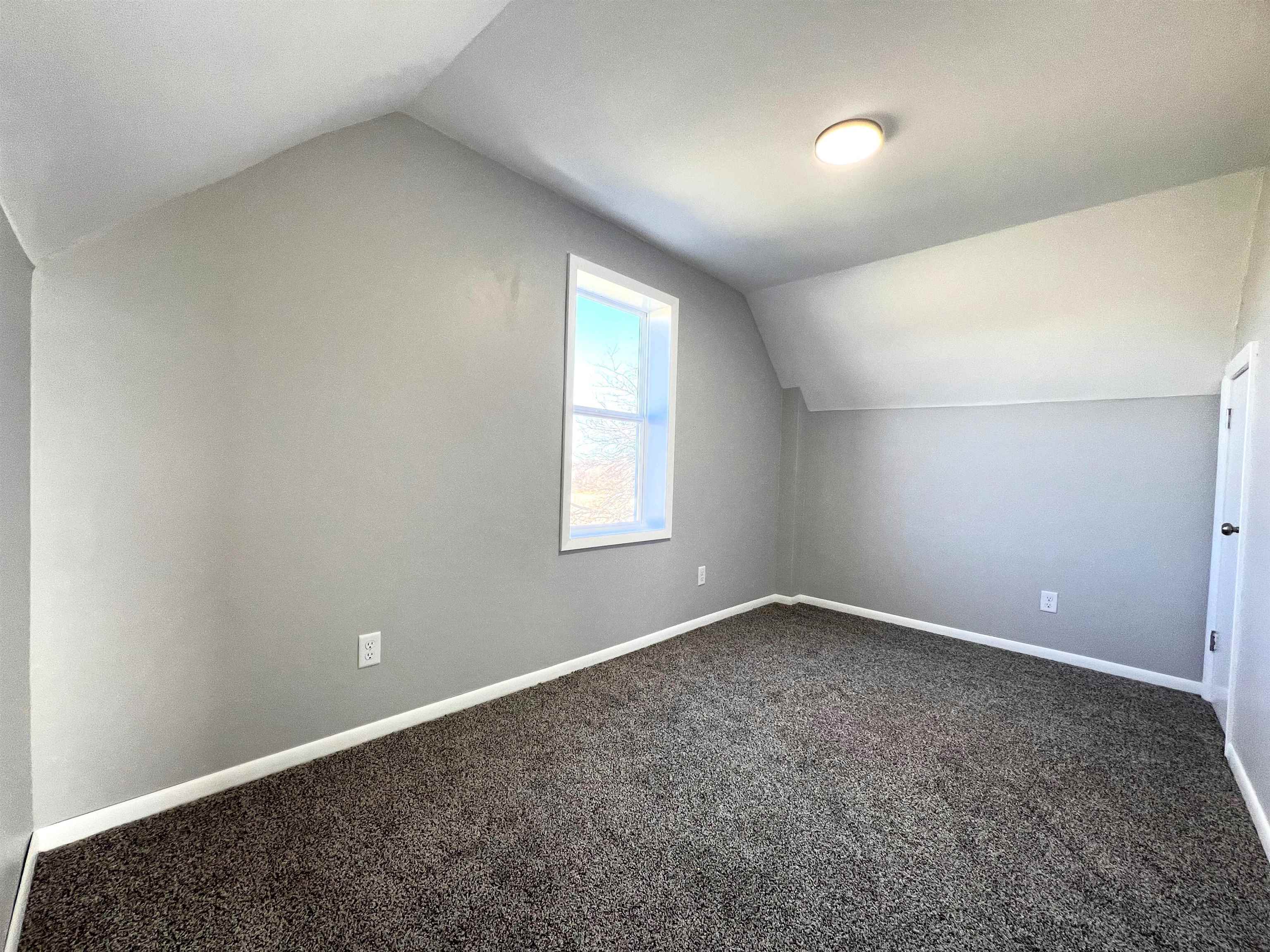 7918 Shirley Road Cherry Valley, IL 61016 - Photo 15 of 36 an empty room with a empty space and windows