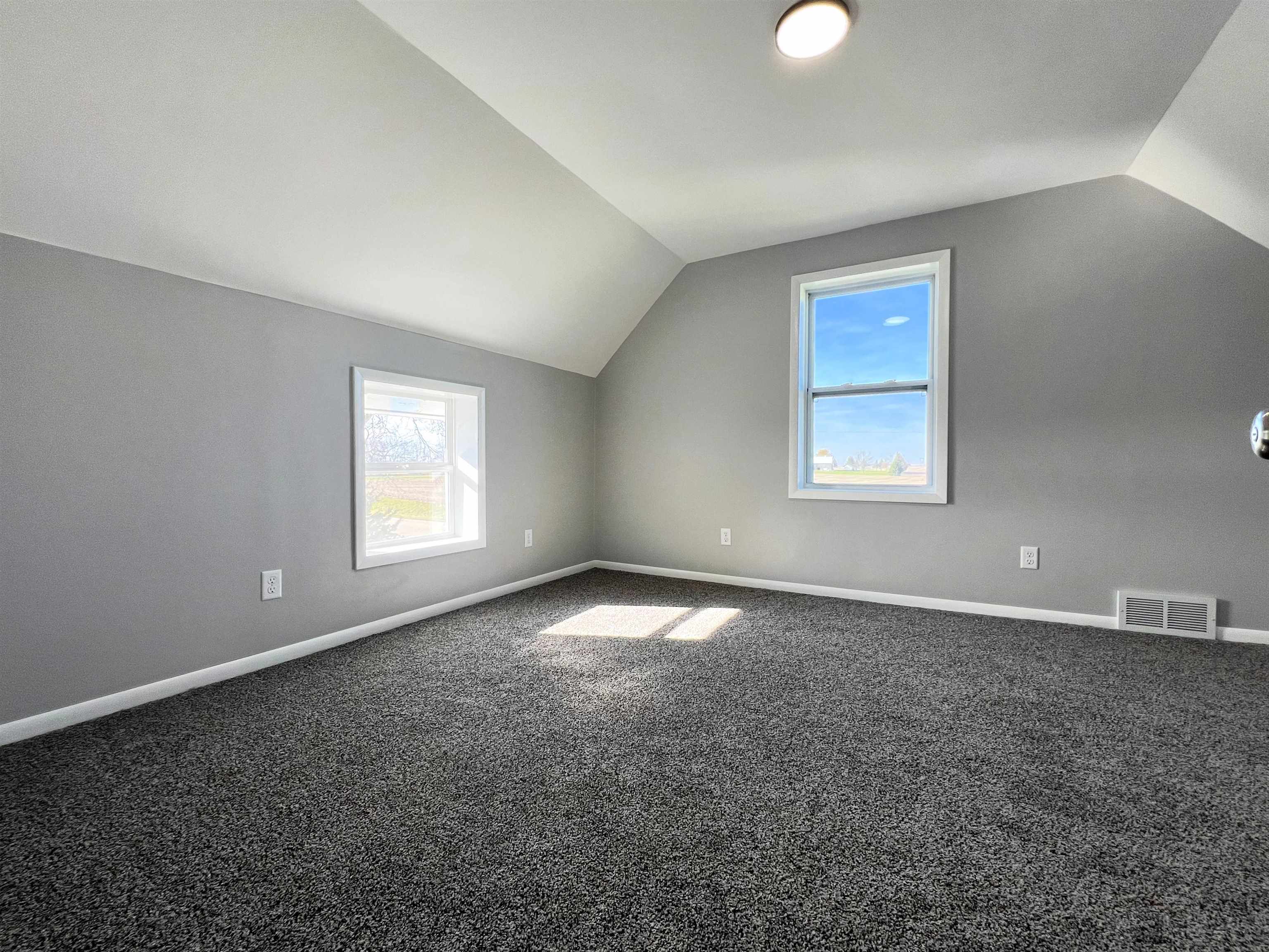 7918 Shirley Road Cherry Valley, IL 61016 - Photo 16 of 36 an empty room with a empty space and windows