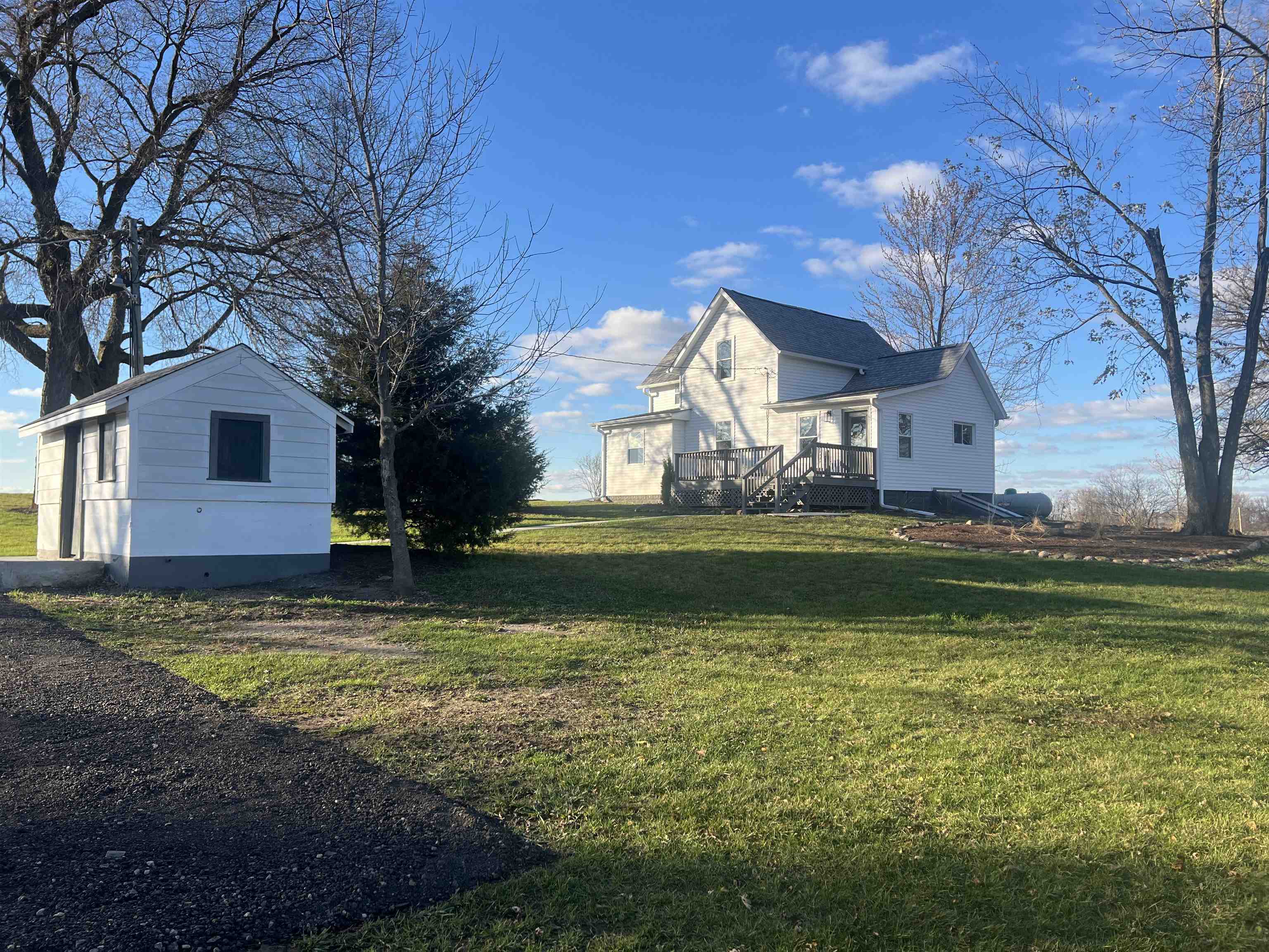 7918 Shirley Road Cherry Valley, IL 61016 - Photo 24 of 36 a view of a house with a yard
