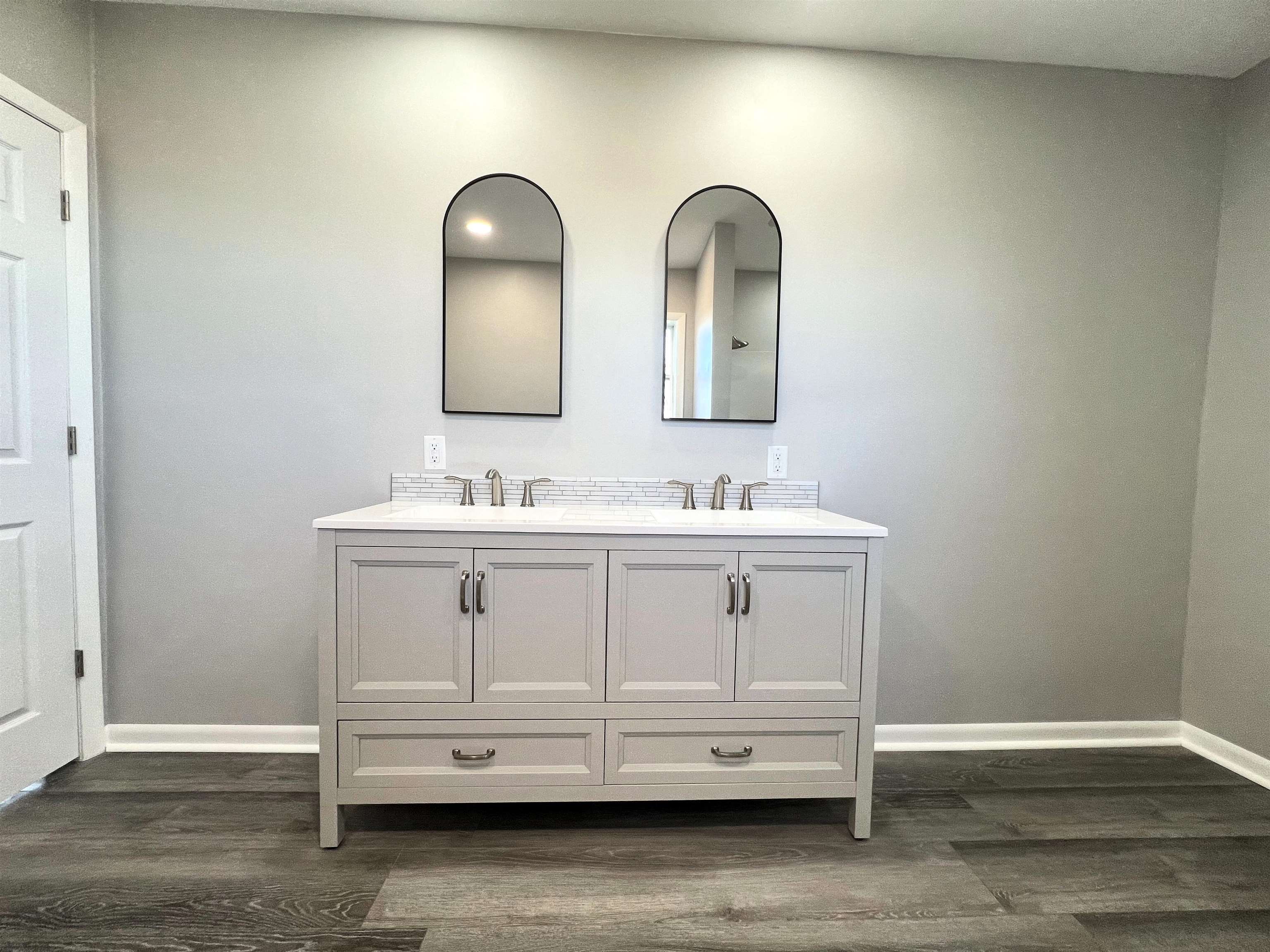 7918 Shirley Road Cherry Valley, IL 61016 - Photo 9 of 36 a bathroom with a sink and a mirror