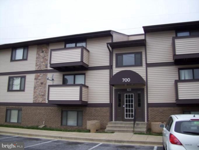 700 H Heather Ridge Drive, Unit 13H Frederick, MD 21702 - Photo 1 of 12 a front view of a house
