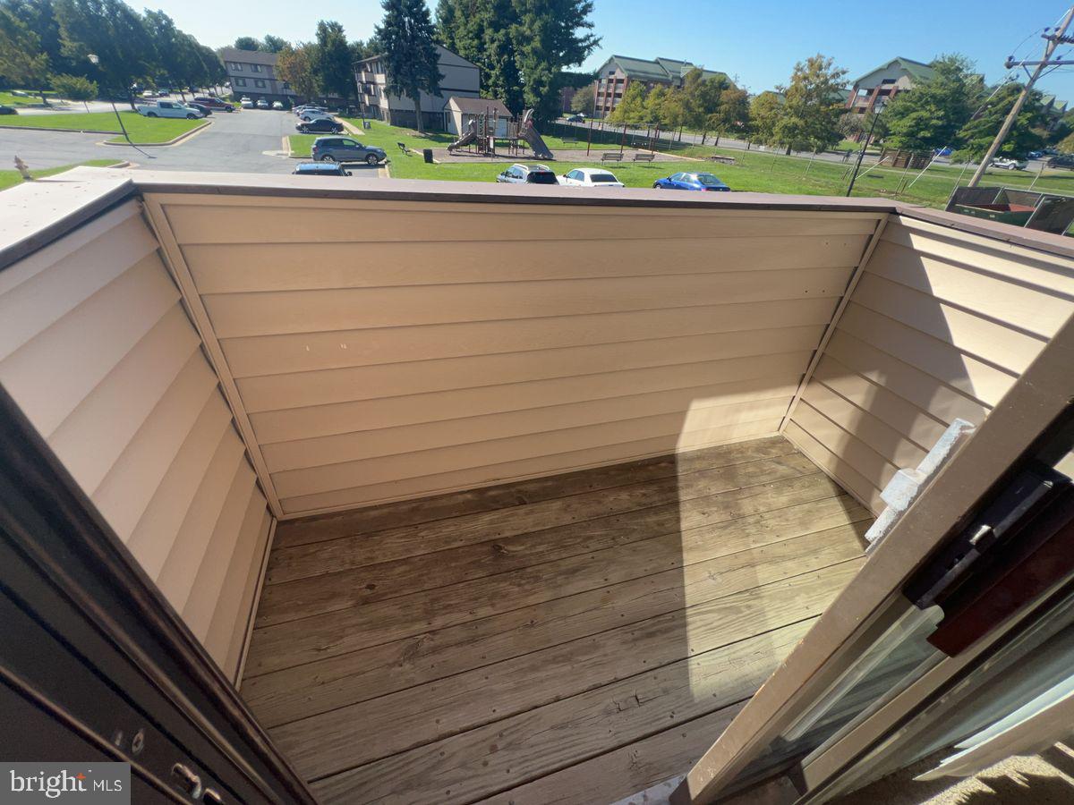 700 H Heather Ridge Drive, Unit 13H Frederick, MD 21702 - Photo 12 of 12 a view of a lake from a balcony